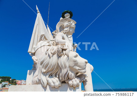 White statue above Lisbon White statue above Lisbon 75986117