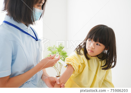 Girl vaccinated Girl vaccinated 75986203