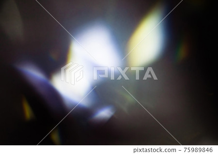 colorful warm rainbow light leaks on black background with dust texture colorful warm rainbow light leaks on black background with dust texture 75989846