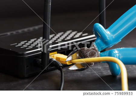 Cutting and disconnecting the network Internet connection with cutting pliers. Cutting and disconnecting the network Internet connection with cutting pliers. 75989933