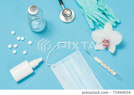 Nitrile gloves, a mask, mercury thermometer and pills for personal protection. Nitrile gloves, a mask, mercury thermometer and pills for personal protection. 75994656