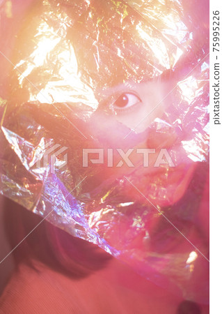 Colorful film and portrait of a woman Colorful film and portrait of a woman 75995226