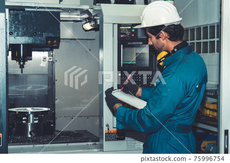 Smart factory worker or engineer do machine job in manufacturing workshop Smart factory worker or engineer do machine job in manufacturing workshop 75996754