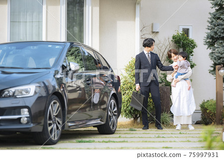 Wife and baby seeing off husband going to work Wife and baby seeing off husband going to work 75997931