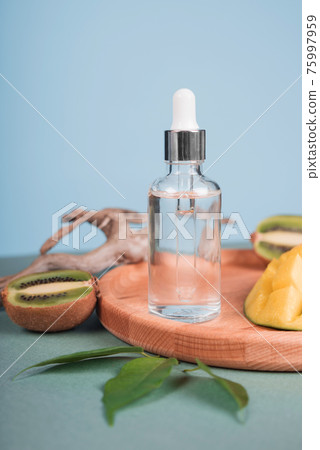 Natural organic cosmetic bottle mock up with leaves and fruit.blank bottle for branding Natural organic cosmetic bottle mock up with leaves and fruit.blank bottle for branding 75997959