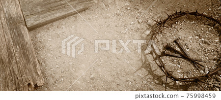 Crucifixion of Jesus Christ. Cross with nails and Crown Of Thorns on ground. Crucifixion of Jesus Christ. Cross with nails and Crown Of Thorns on ground. 75998459