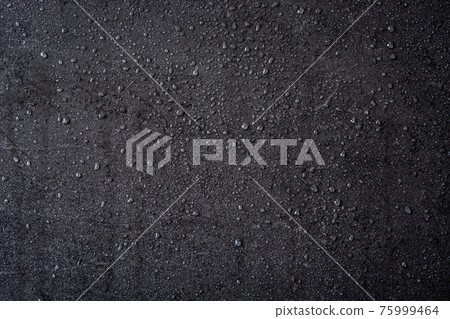 Black background with raindrops 75999464