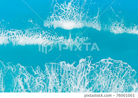 Resin art with blue waves. Sea background made of epoxy resin art 76001001