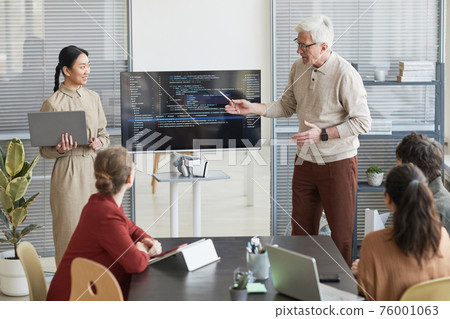 Senior Man Presenting Code Senior Man Presenting Code 76001063