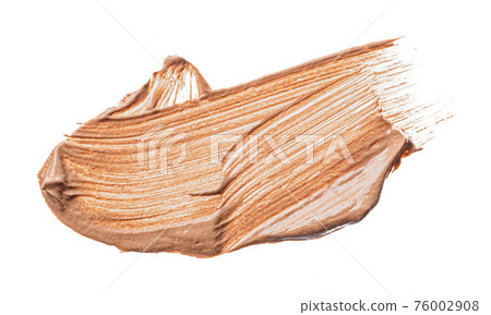 Cream foundation smudged stains isolated on white 76002908