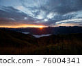 Early morning in the mountains. The sun rises over the mountains. Dawn in the mountains. 76004341