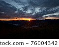 Early morning in the mountains. The sun rises over the mountains. Dawn in the mountains. 76004342