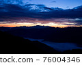 Early morning in the mountains. The sun rises over the mountains. Dawn in the mountains. 76004346