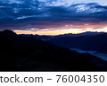 Early morning in the mountains. The sun rises over the mountains. Dawn in the mountains. 76004350