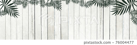 The Old white wooden lath and green leaf pattern texture background. 76004477