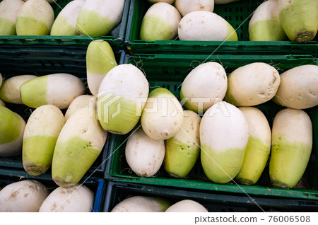 Radish piled on the counter 76006508
