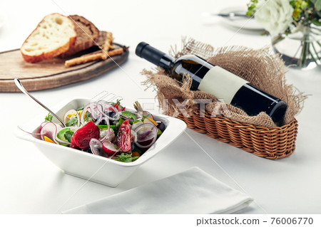 Beautifully decorated catering banquet table with different food snacks and appetizers 76006770