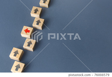 Red arrow stands out from the others and changes direction to go out of order. Thinking outside the box. New strategies and solutions. Atypical, leadership qualities. Denial of conformism. 76008579