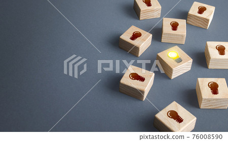 One glowing light bulb idea among many dark off. Concept choosing best suitable idea from presented. Developing startup. Business accelerator. Innovation promising technologies. Search for talent. 76008590