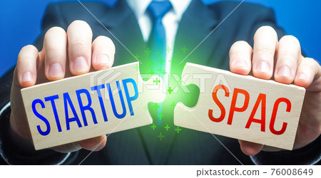 Man connects puzzles with Startup and SPAC. Simplified listing entry to stock exchange. Special purpose acquisition company. Attraction of investments, sale bonds shares for future company merger. 76008649