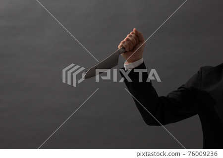 Men's suit with a knife at hand Men's suit with a knife at hand 76009236