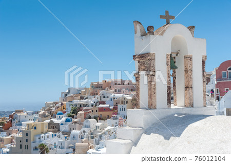 Bell tower in front of Oia - Santorini 76012104