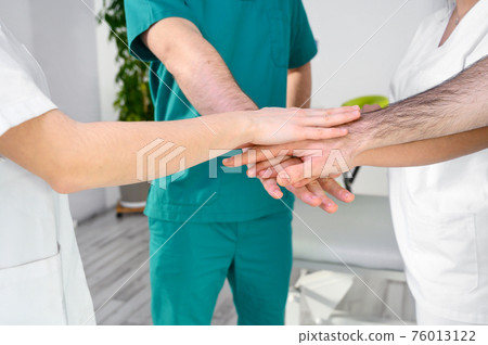 Group of unified healthcare professionals 76013122