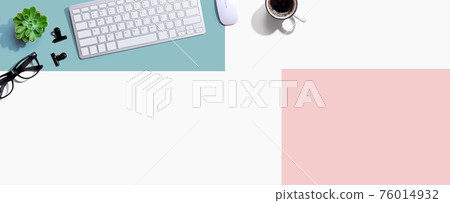 Computer keyboard with a cup of coffee and eyeglasses Computer keyboard with a cup of coffee and eyeglasses 76014932