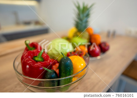 Fruits And Vegetables On The Table Of Modern Kitchen Fruits And Vegetables On The Table Of Modern Kitchen 76016101