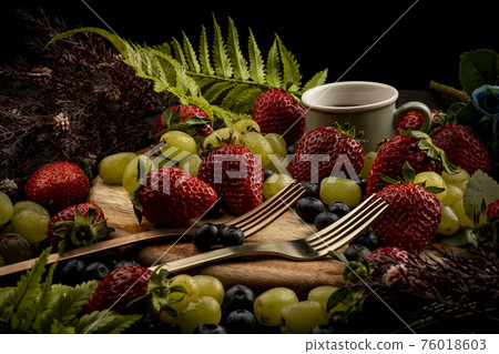 Strawberries, green grapes, blueberries Strawberries, green grapes, blueberries 76018603