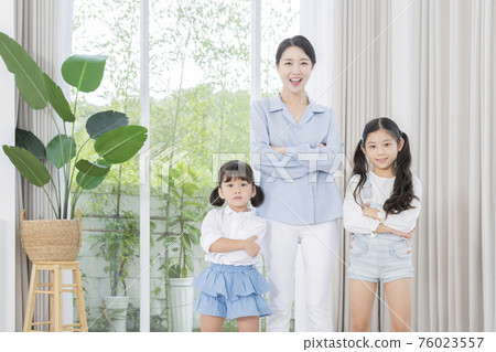 Portrait of happy cheerful family, young mother and two daughters 355 Portrait of happy cheerful family, young mother and two daughters 355 76023557