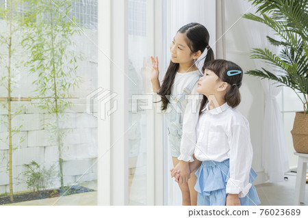 Portrait of happy cheerful family, young mother and two daughters 304 Portrait of happy cheerful family, young mother and two daughters 304 76023689