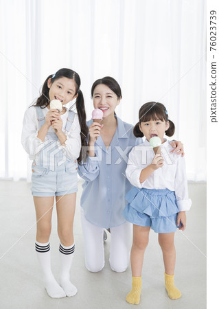 Portrait of happy cheerful family, young mother and two daughters 374 Portrait of happy cheerful family, young mother and two daughters 374 76023739
