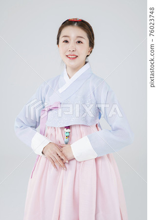 Male and female in Korean traditional clothes Hanbok 005 76023748