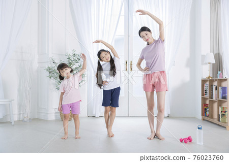 Portrait of happy cheerful family, young mother and two daughters 394 Portrait of happy cheerful family, young mother and two daughters 394 76023760