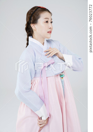 Male and female in Korean traditional clothes Hanbok 039 76023772