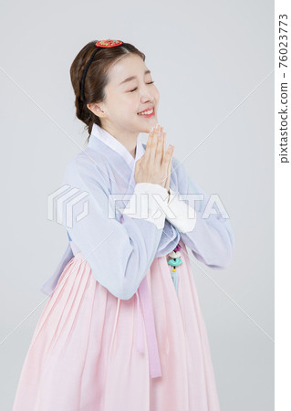 Male and female in Korean traditional clothes Hanbok 015 76023773