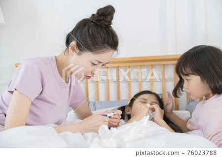 Portrait of happy cheerful family, young mother and two daughters 485 76023788