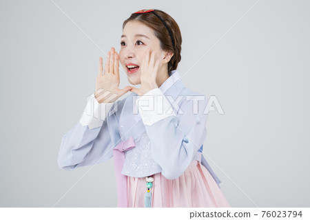 Male and female in Korean traditional clothes Hanbok 018 76023794