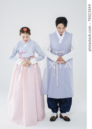 Male and female in Korean traditional clothes Hanbok 078 76023844