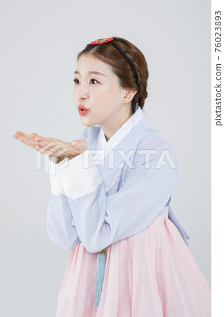Male and female in Korean traditional clothes Hanbok 028 76023893