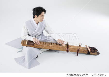 Male and female in Korean traditional clothes Hanbok. comic humorous concept. 078 76023957