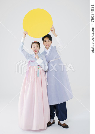 Male and female in Korean traditional clothes Hanbok 161 76024051