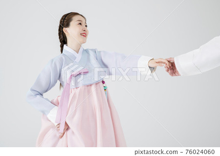 Male and female in Korean traditional clothes Hanbok 178 76024060