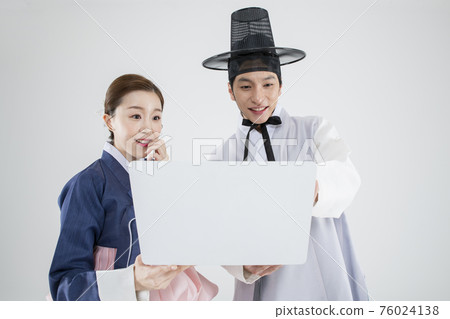 Male and female in Korean traditional clothes Hanbok. comic humorous concept. 134 Male and female in Korean traditional clothes Hanbok. comic humorous concept. 134 76024138