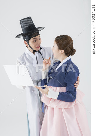 Male and female in Korean traditional clothes Hanbok. comic humorous concept. 133 76024181