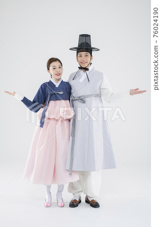 Male and female in Korean traditional clothes Hanbok. comic humorous concept. 101 76024190