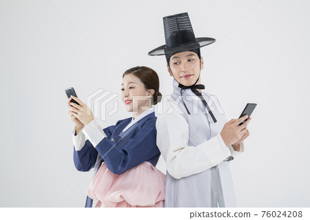 Male and female in Korean traditional clothes Hanbok. comic humorous concept. 127 76024208