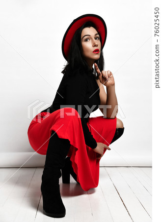 Stylish sexy adult woman in black top, red maxi Stylish sexy adult woman in black top, red maxi 76025450