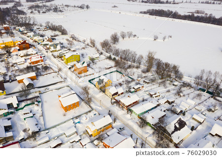 Top view over city Bronnitsy in winter day. View from above Top view over city Bronnitsy in winter day. View from above 76029030